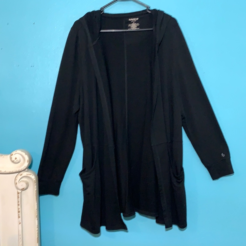 Torrid active cardigan/hoodie with front pockets.